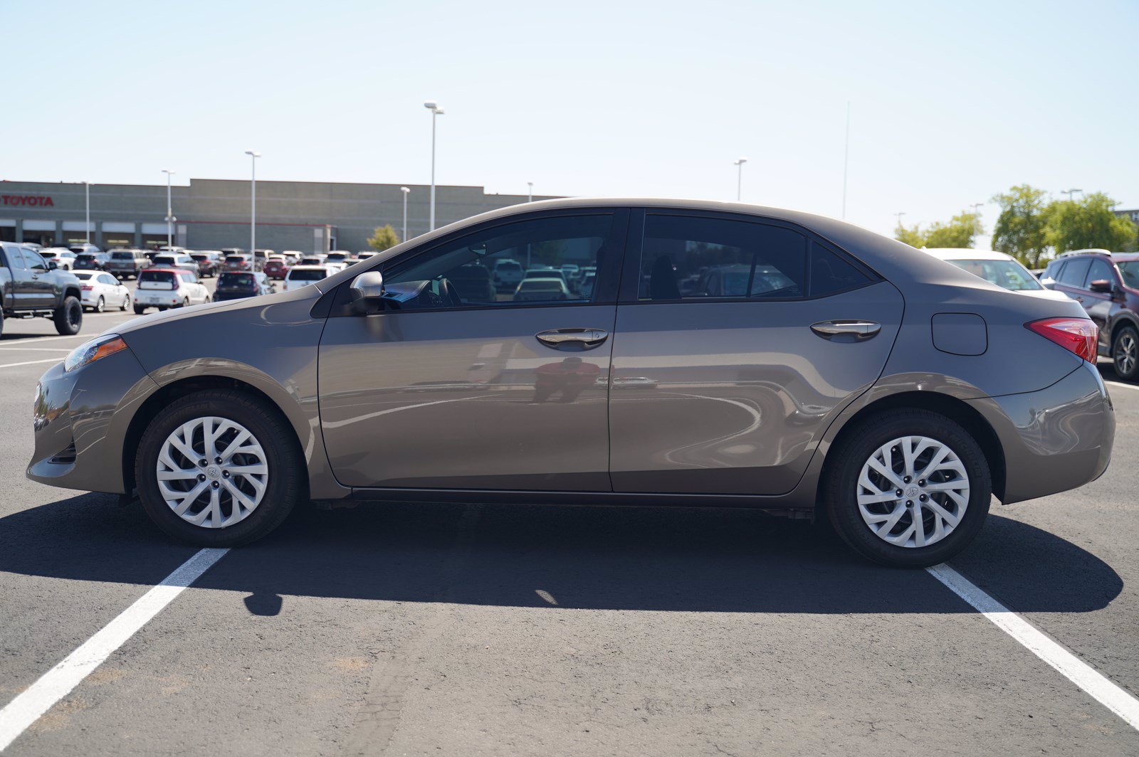 Certified Pre-Owned 2019 Toyota Corolla LE FWD 4dr Car